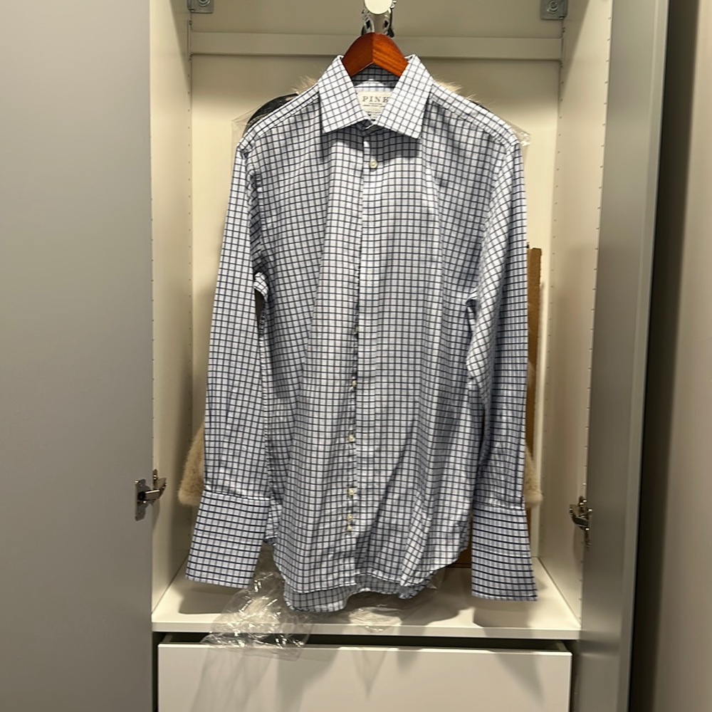 A casual Thomas pink button down shirt
